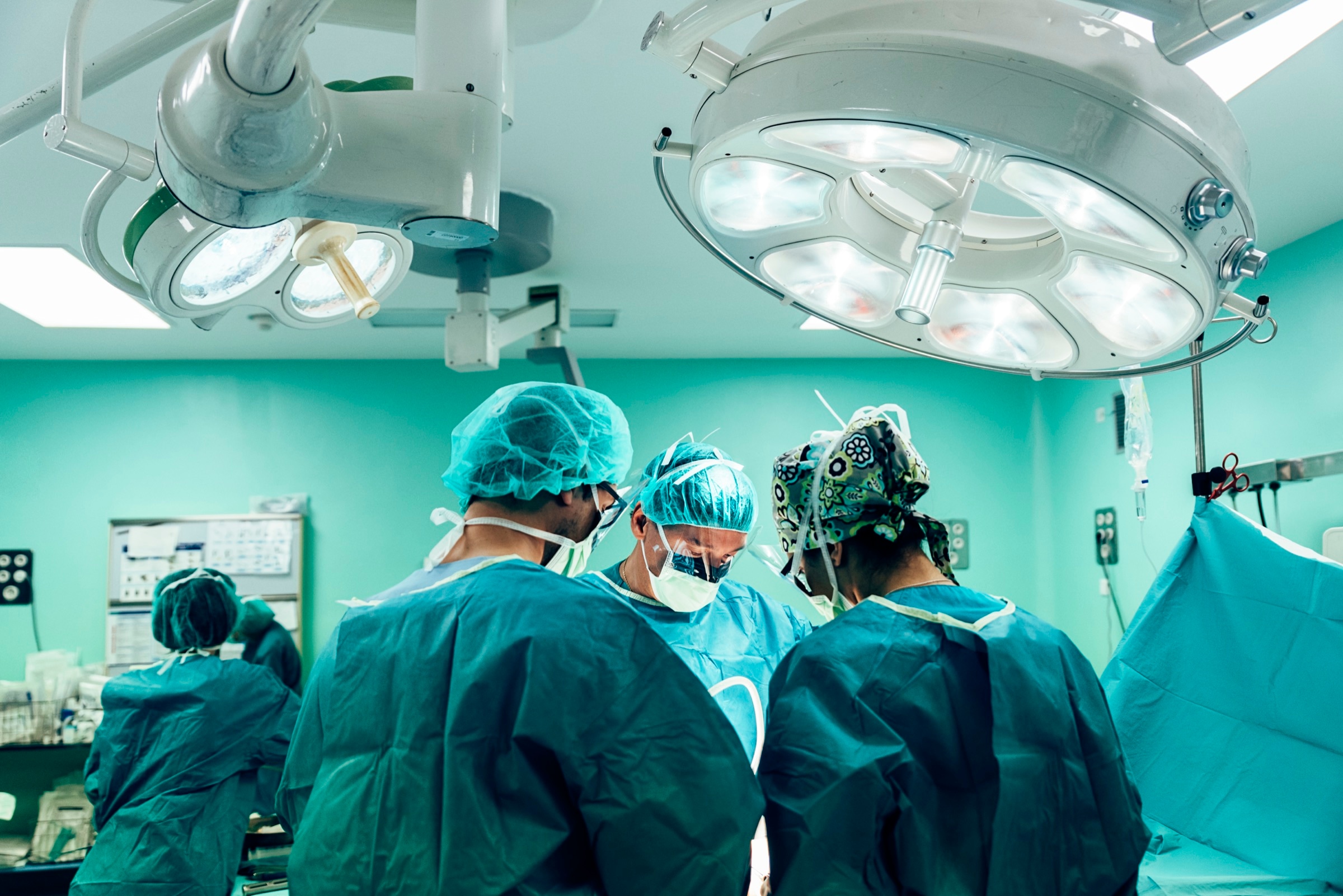Team of surgeons operating in a hospital